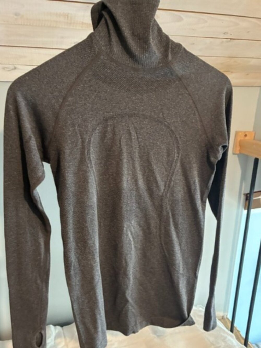 Lululemon size 6 running shirt.